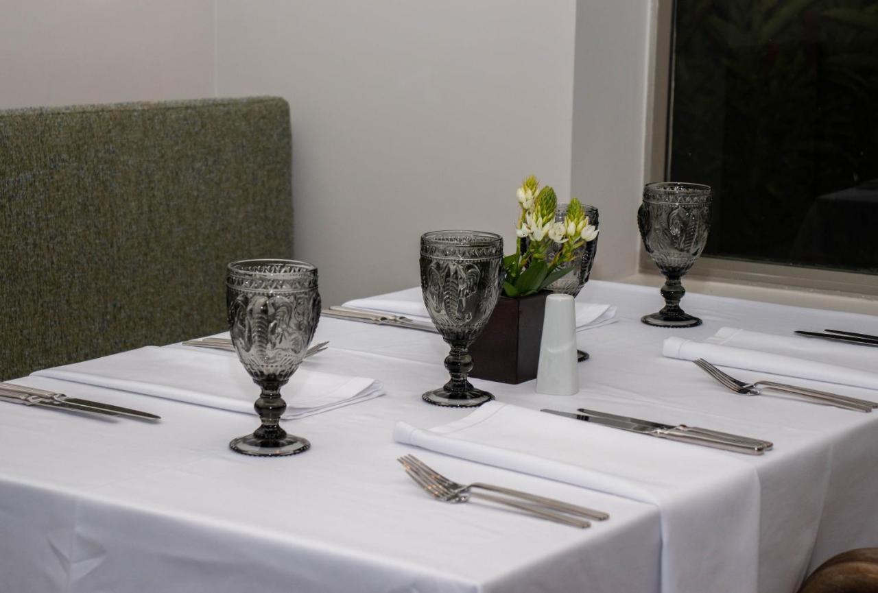 Hotel Estelar Altamira Ibagué Exterior foto A table set for a meal